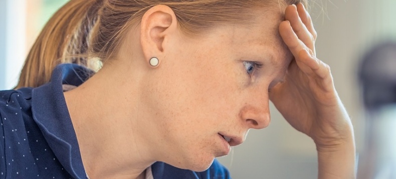 frustrated-woman-hand-on-head-realising-the-signs-of-poor-training-software-usability